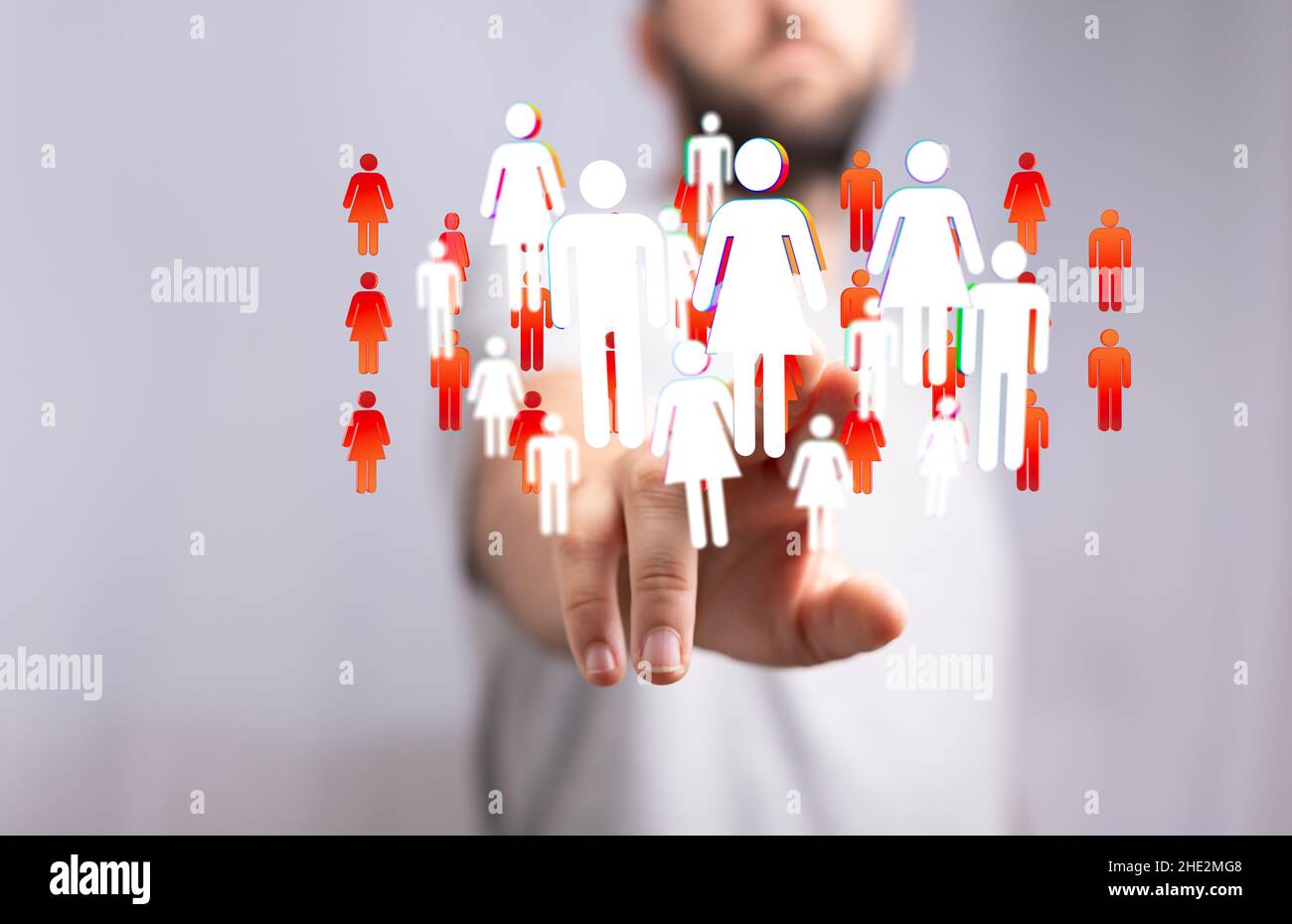 Businessman tapping on a floating render of gendered profile icons-network, connection concept Stock Photo