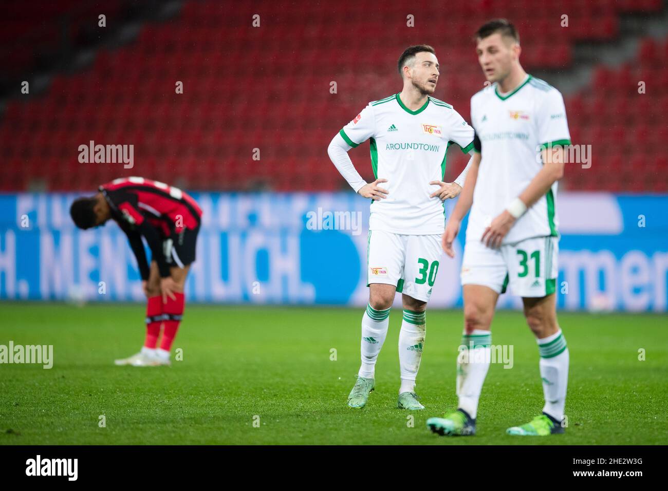 Leverkusen, Germany. 08th Jan, 2022. Soccer: Bundesliga, Bayer Leverkusen - 1. FC Union Berlin, Matchday 18, BayArena. Berlin's Kevin Möhwald (center) reacts after the match. Credit: Marius Becker/dpa - IMPORTANT NOTE: In accordance with the requirements of the DFL Deutsche Fußball Liga and the DFB Deutscher Fußball-Bund, it is prohibited to use or have used photographs taken in the stadium and/or of the match in the form of sequence pictures and/or video-like photo series./dpa/Alamy Live News Stock Photo