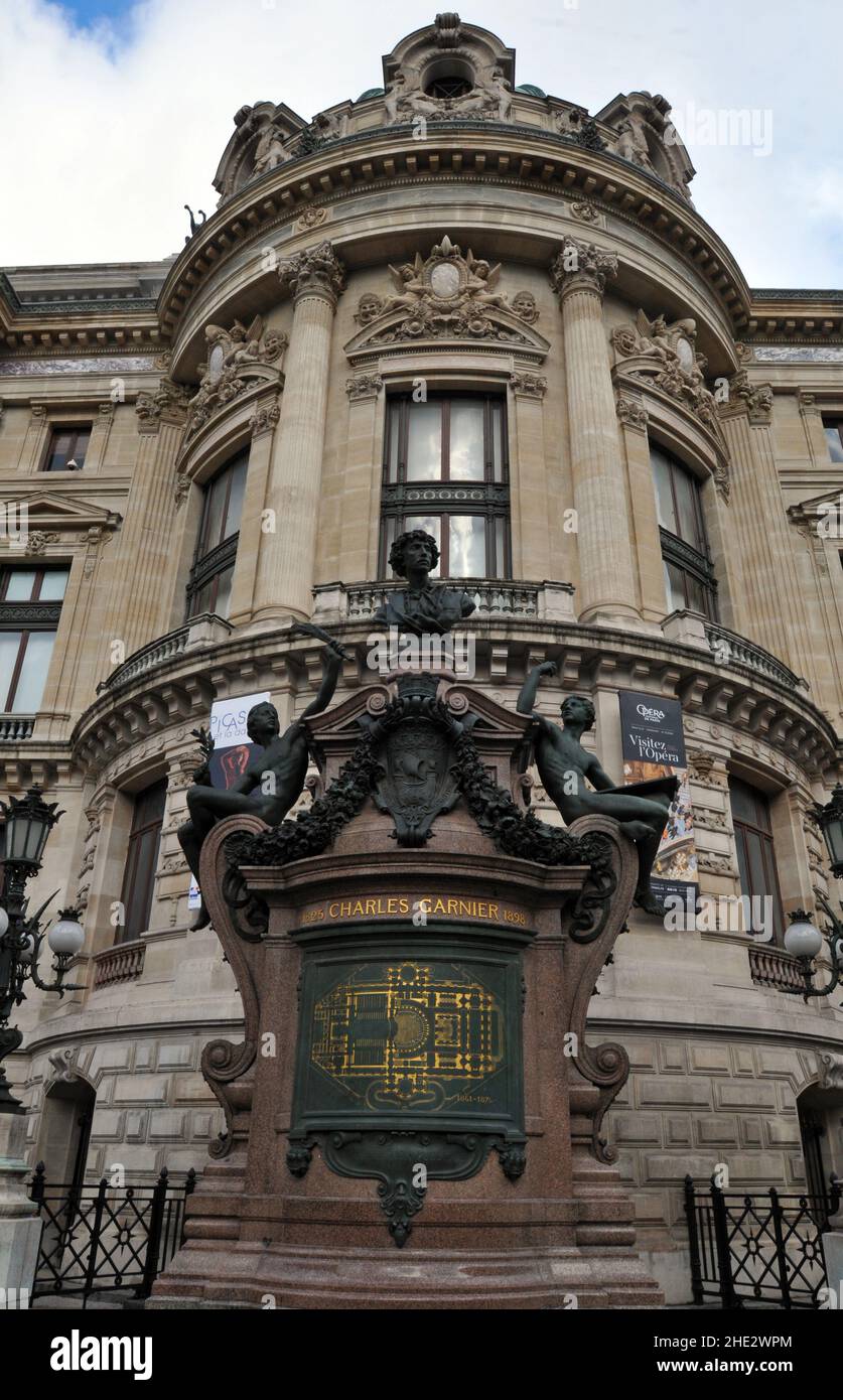 Memorial to architect Charles Garnier at the west facade of Paris' landmark Palais Garnier opera house. The performing arts venue opened in 1875. Stock Photo
