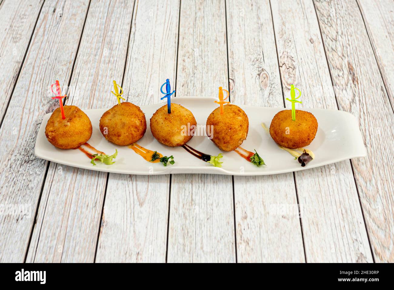 croqueta crujiente por fuera y tan cremosa por dentro que se funde en