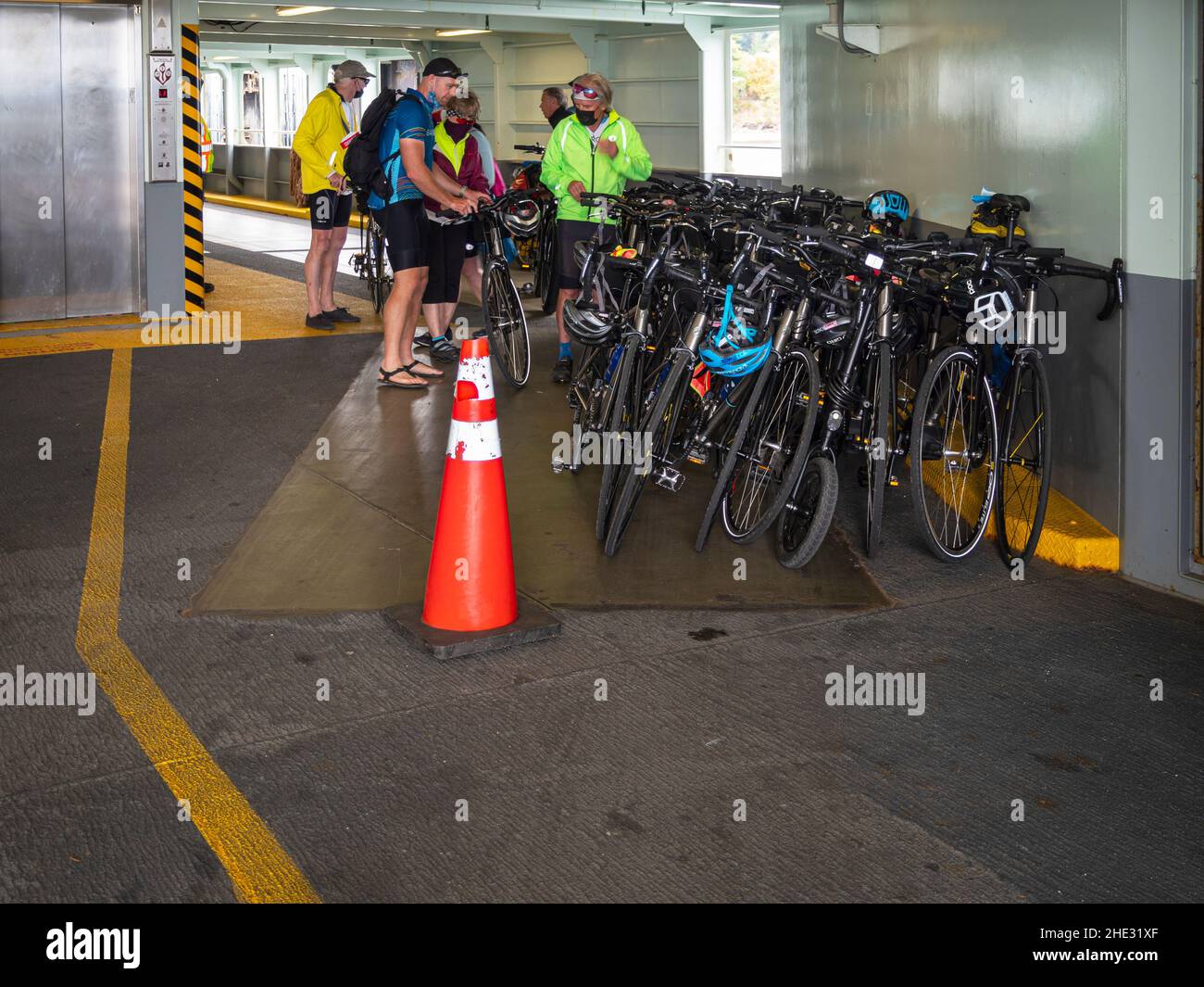 WA210143-00...WASHINGTON - Bikes and riders on the Anacortes to Orcas Island ferry in the San Juan Islands. Stock Photo