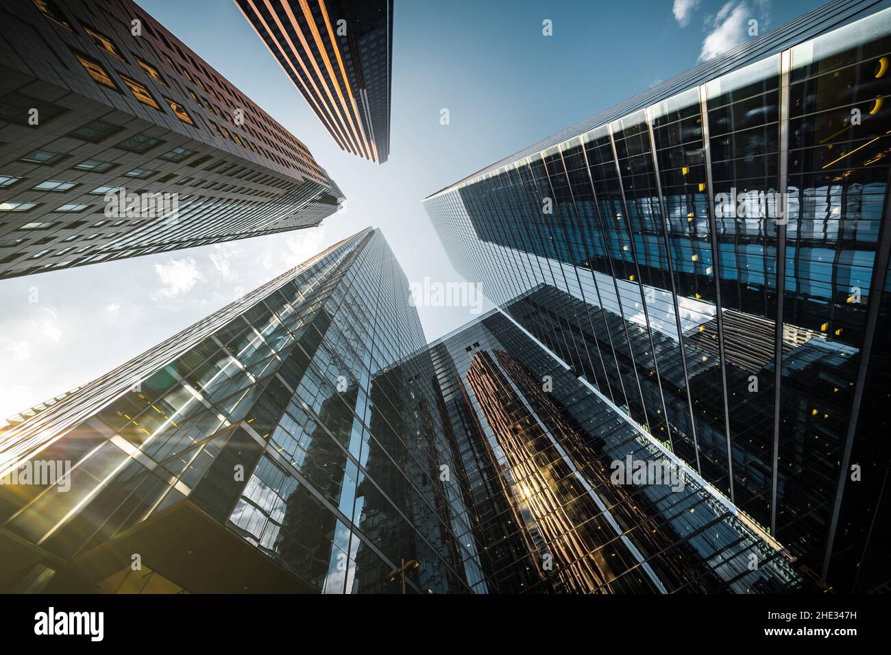 Business and finance concept, looking up at high rise office buildings in the financial district of a modern metropolis. Stock Photo