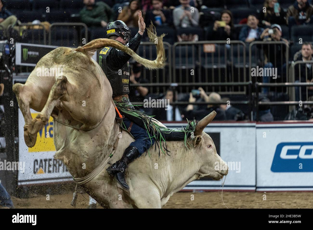 New York, USA. 07th Jan, 2022. Jess Lockwood of Volborg, Montana rides a bull during PBR Unleash The Beast at Madison Square Garden in New York on January 7, 2022. This is an annual event, which was canceled in 2021 because of COVID-19 pandemic and returned this year with COVID protocol in place. (Photo by Lev Radin/Sipa USA) Credit: Sipa USA/Alamy Live News Stock Photo