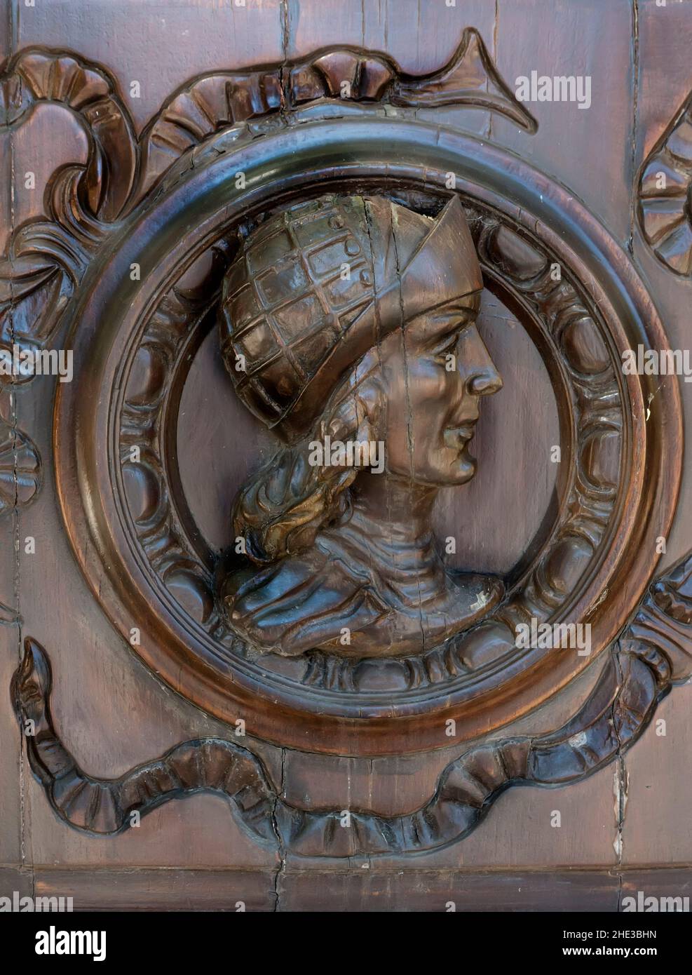 Relief art sculpted on wooden gate in Buenos Aires, Argentina Stock Photo