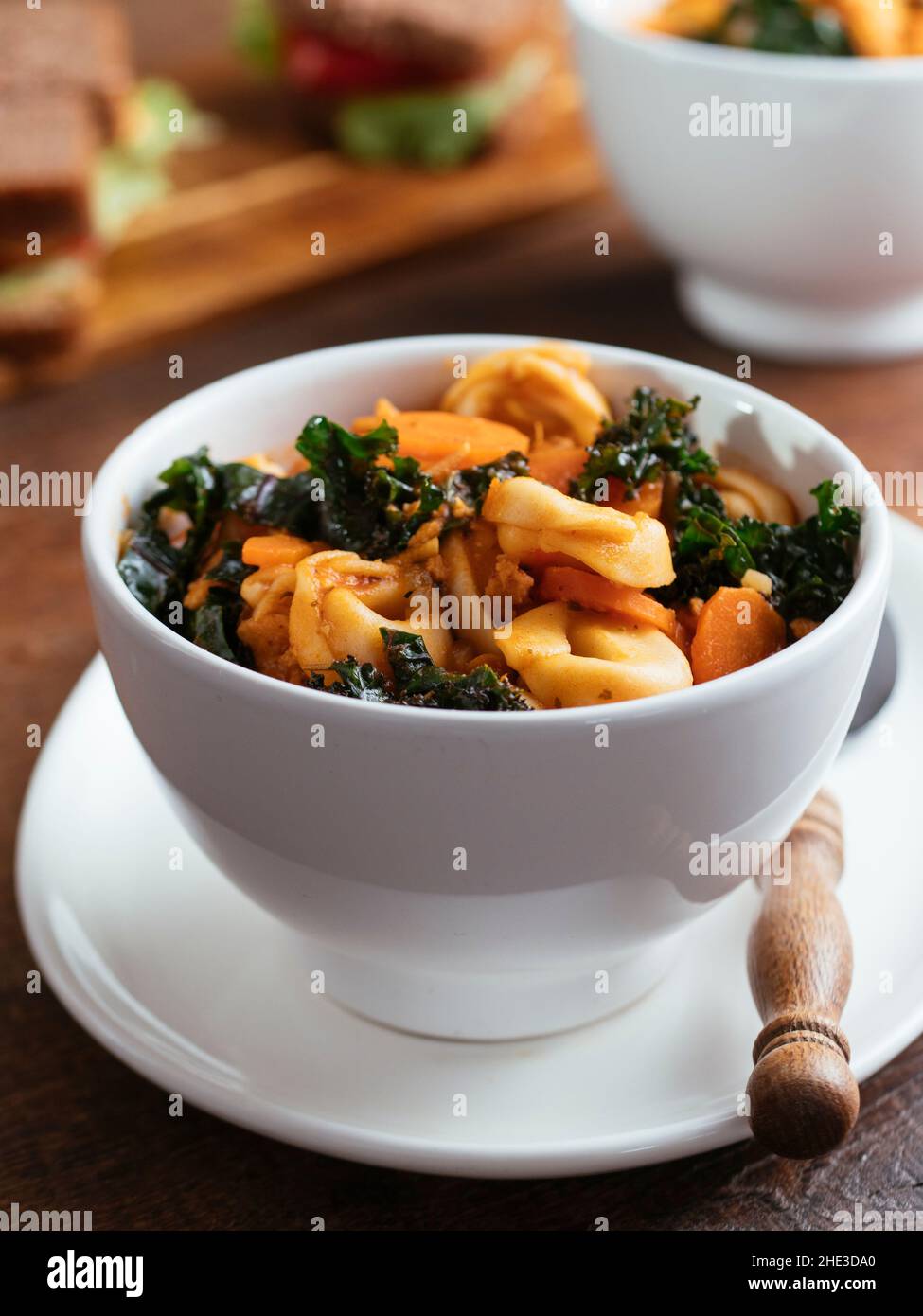 Home made Vegan Tortellini Soup with TVP and Kale Stock Photo