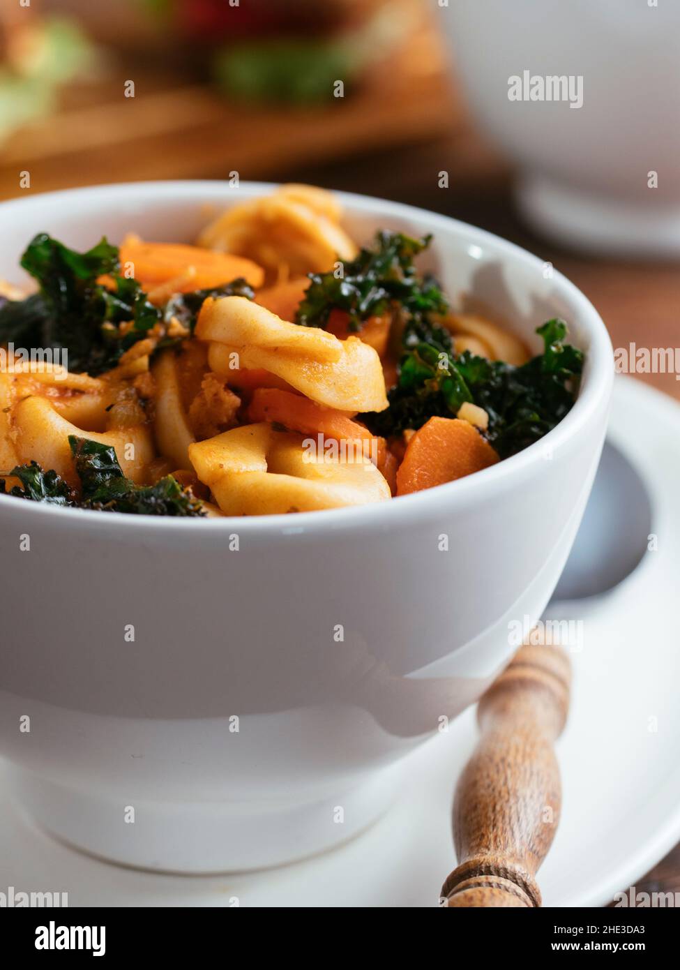 Home made Vegan Tortellini Soup with TVP and Kale Stock Photo