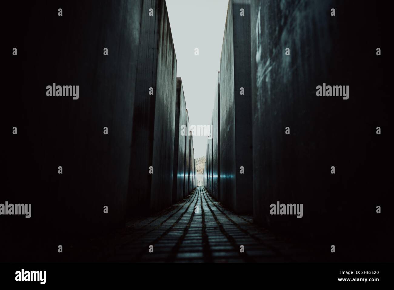 Berlin, Germany. Dark maze, tall blocks in Holocaust Jewish Memorial of ...