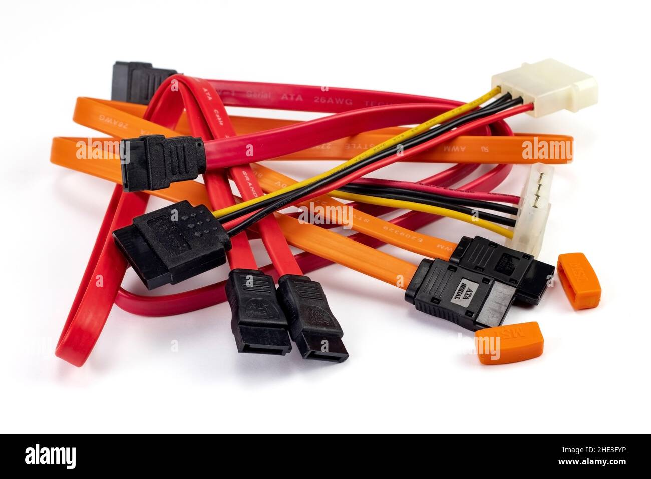 Various PC cables isolated on a white background. SATA and ATA pile cables. Stock Photo