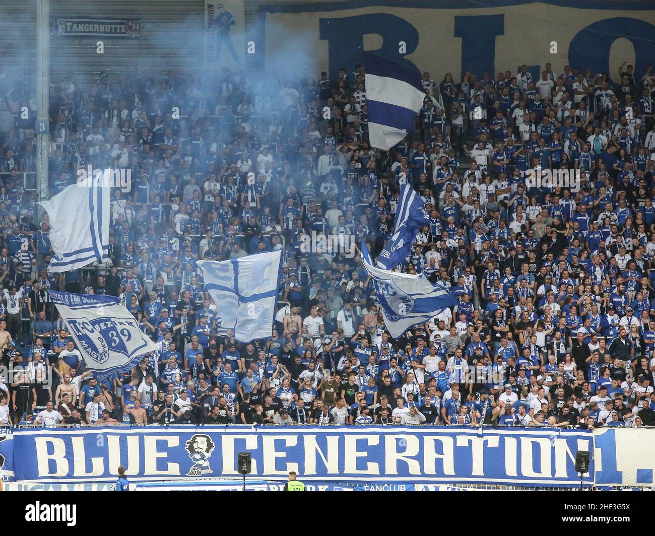 Fan Block Blue Generation 1.FC Magdeburg Soccer DFB Pokal 1st Main Round Season 2021-2022 1. FC Magdeburg Vs. FC St. Pauli In The MDCC Arena In Magdeb Stock Photo