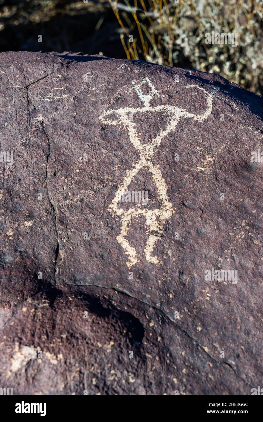 Dancing petroglyph figure in Three Rivers Petroglyph Site near Tularosa, New Mexico. Stock Photo