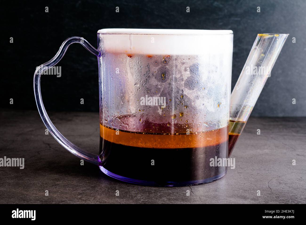 Glazed Ham Cooking Juices in a Fat Separator Pan juices from roasting