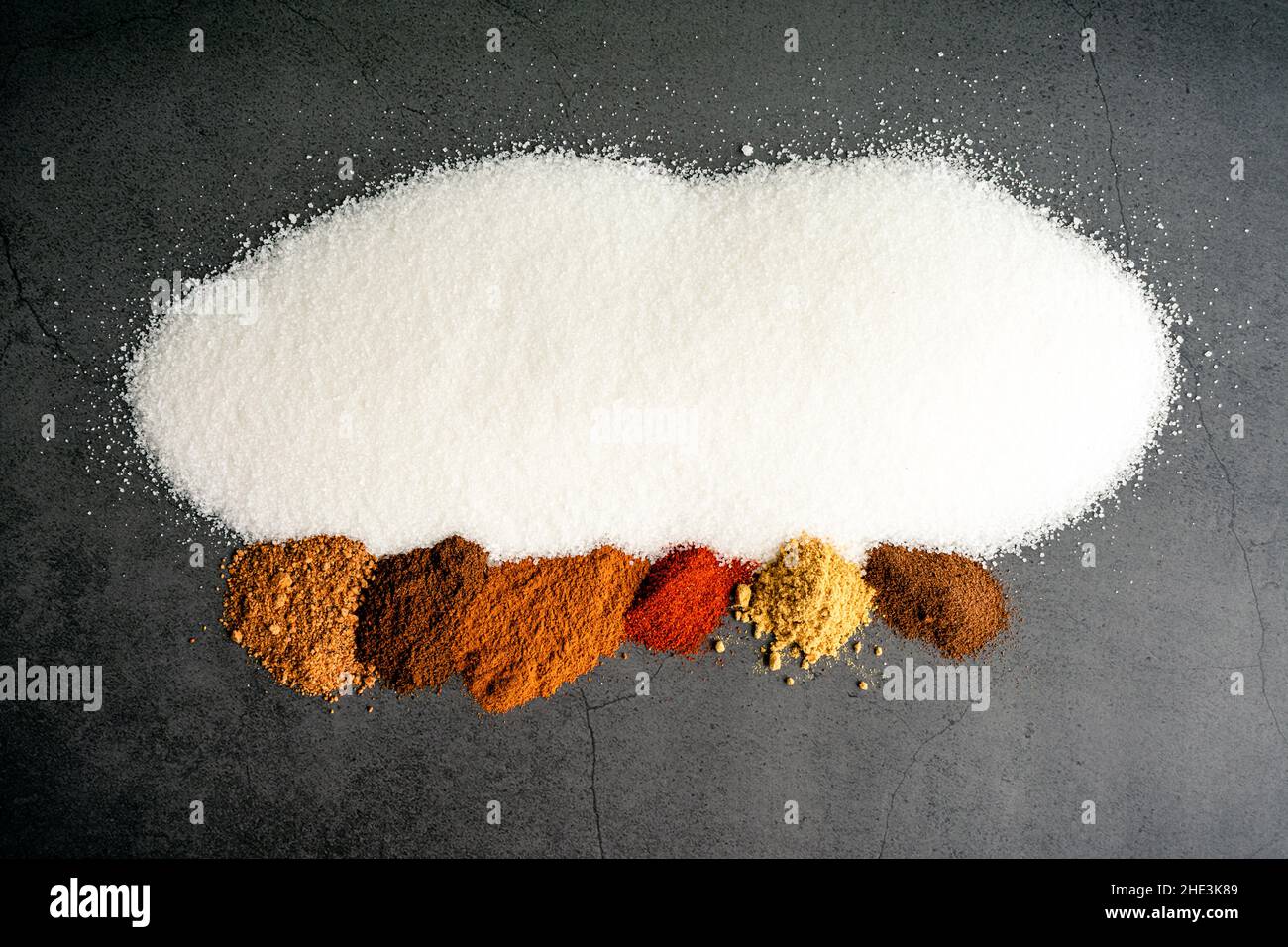 Ham Glaze Ingredients on a Dark Background Sugar and spices used to make a ham glaze on a dark