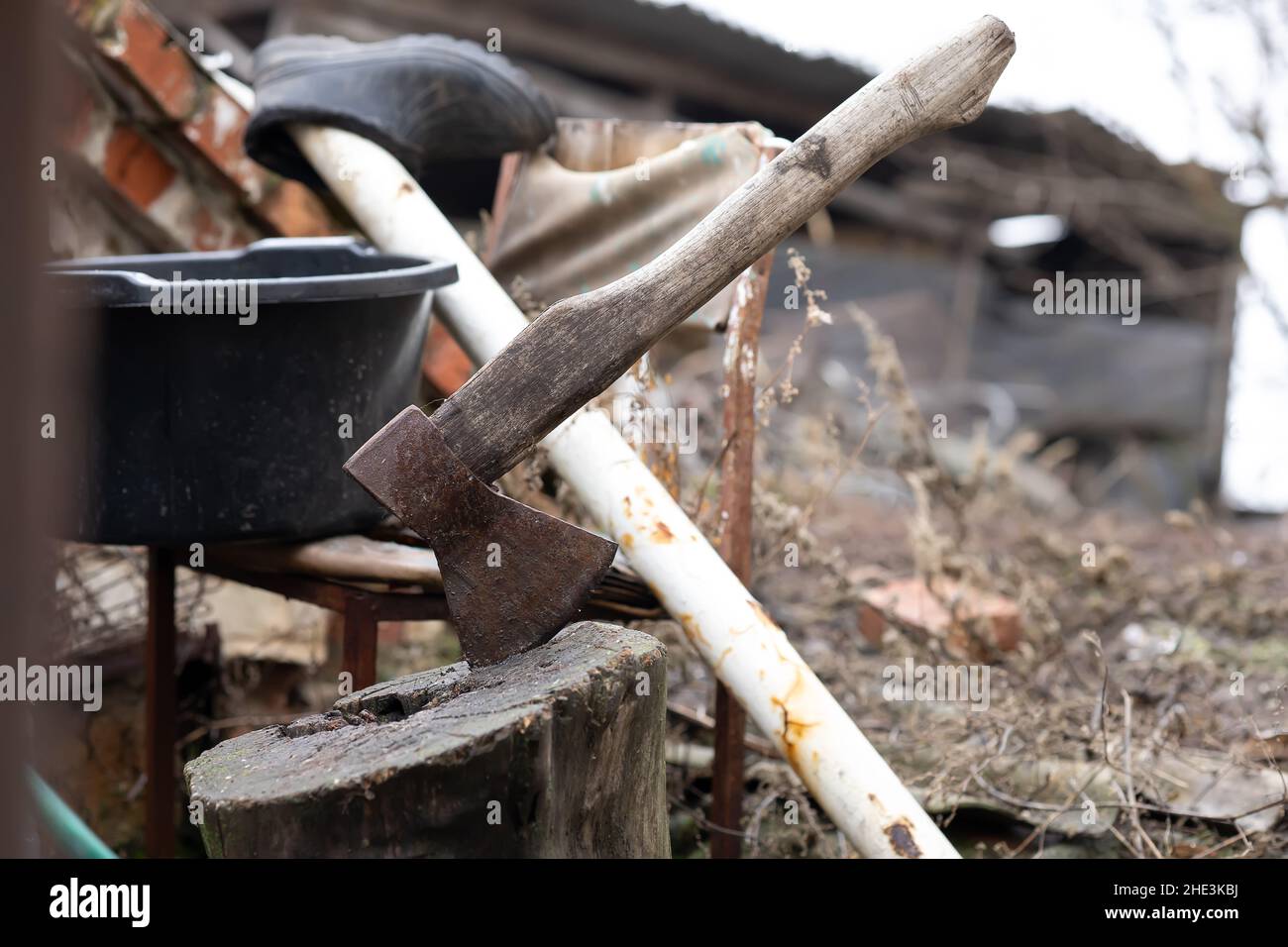 Axe in tree stump yard hi-res stock photography and images - Alamy