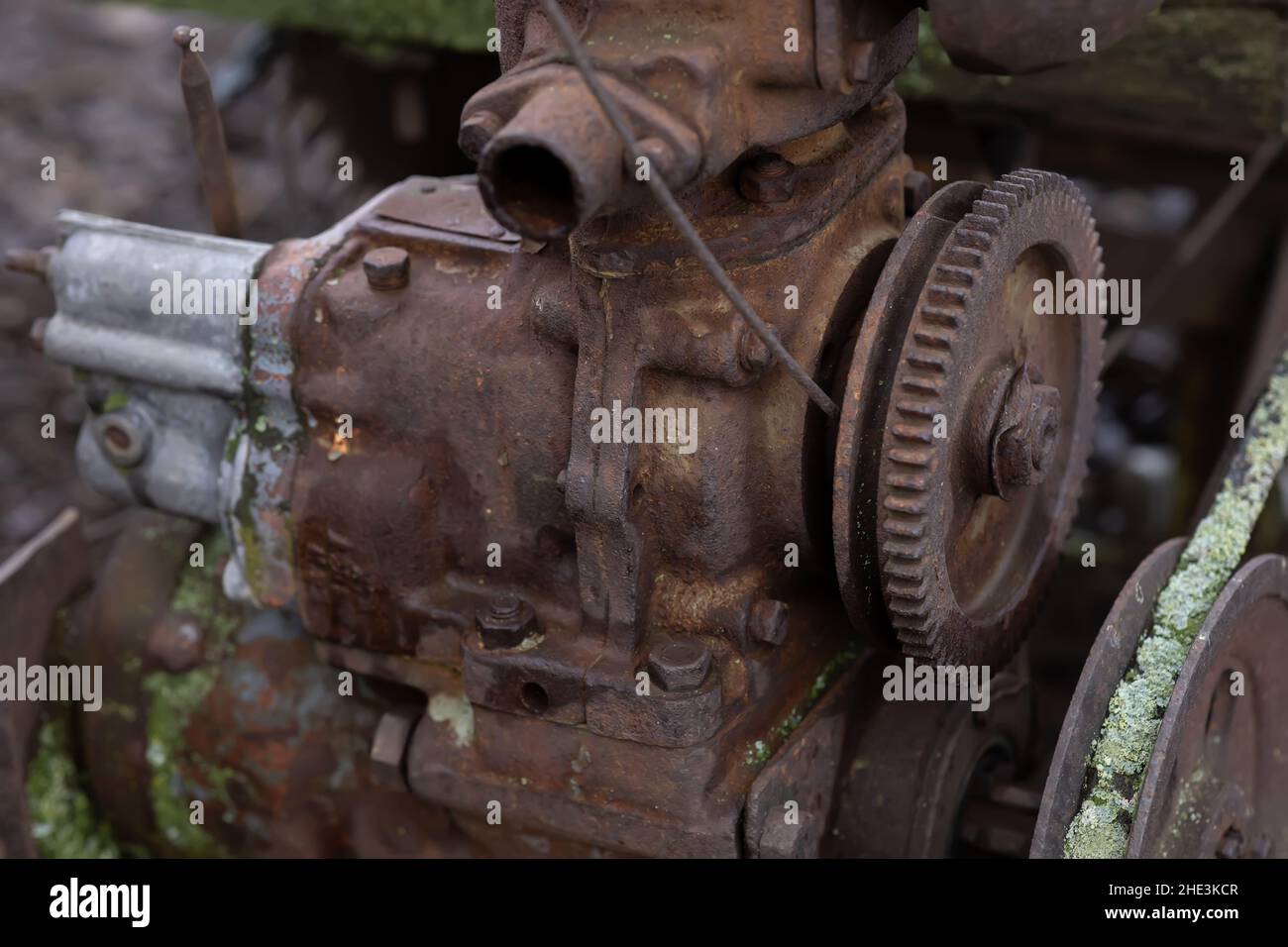 rusty non-working motor in the yard Stock Photo