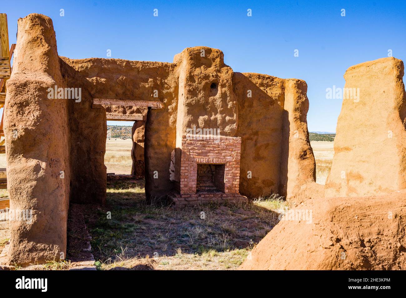 Remains of adobe walls and fireplace in living quarter area at Fort Union National Monument. Evidence of a lonely and harsh life. Stock Photo