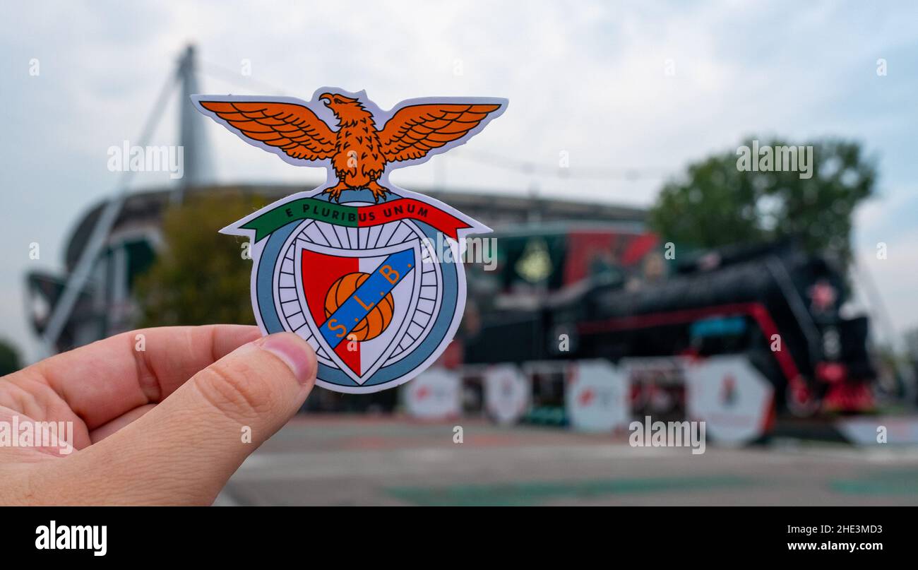 August 30, 2021, Lisbon, Portugal. S.L. football club emblem Benfica against the backdrop of a modern stadium. Stock Photo