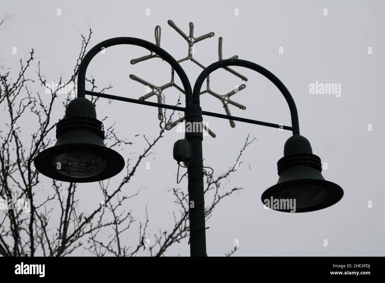 Street lamp in Riverton WY, on main street decorated for the holidays Stock Photo