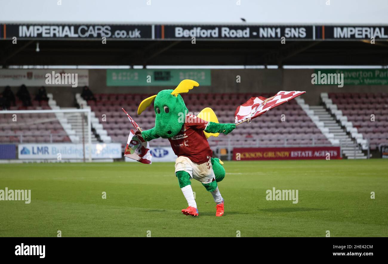 Northampton Town FC Mascot Clarence the Dragon runs around on the pitch before the EFL League Two match between Northampton Town and Crawley Town at Sixfields Stadium. 8th January 2022 Stock Photo