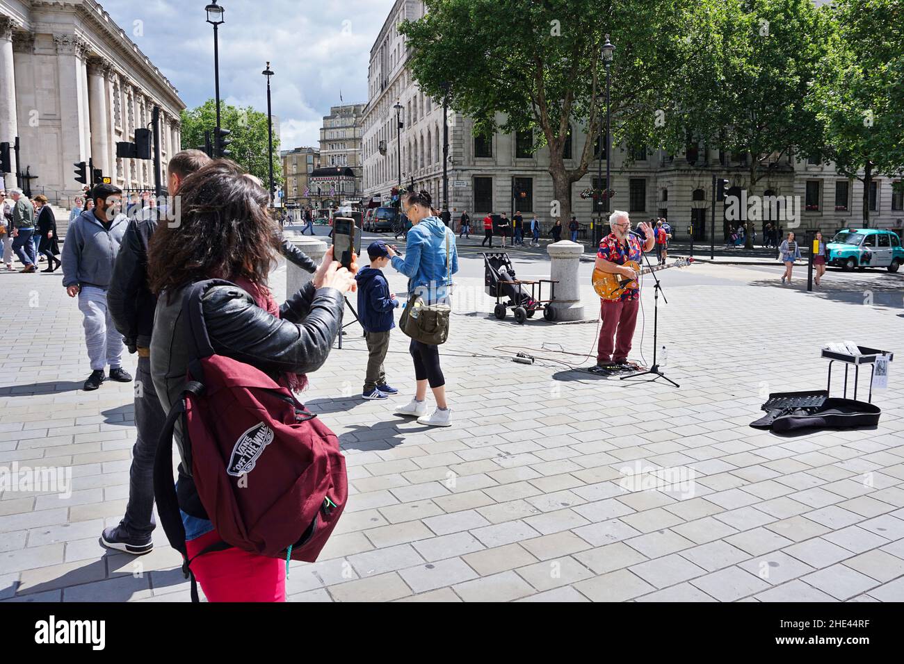 Street performer singing at the Trafalgar Square, London. Stock Photo