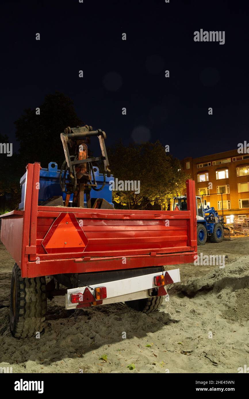 Construction place in front of apartment buildings in the night Stock ...