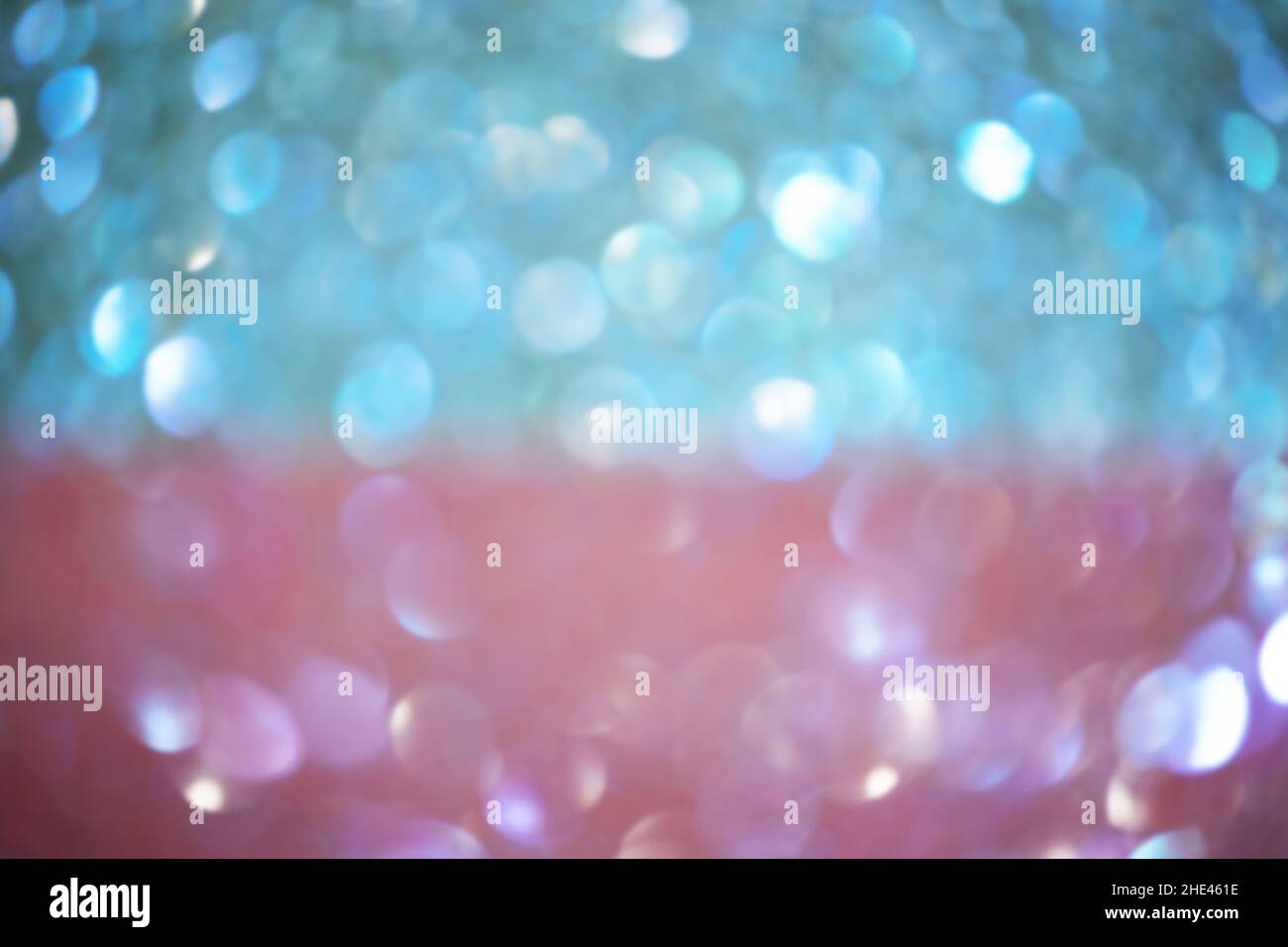 Abstract background blur focus. Defocus light blue and pink sparkles ...
