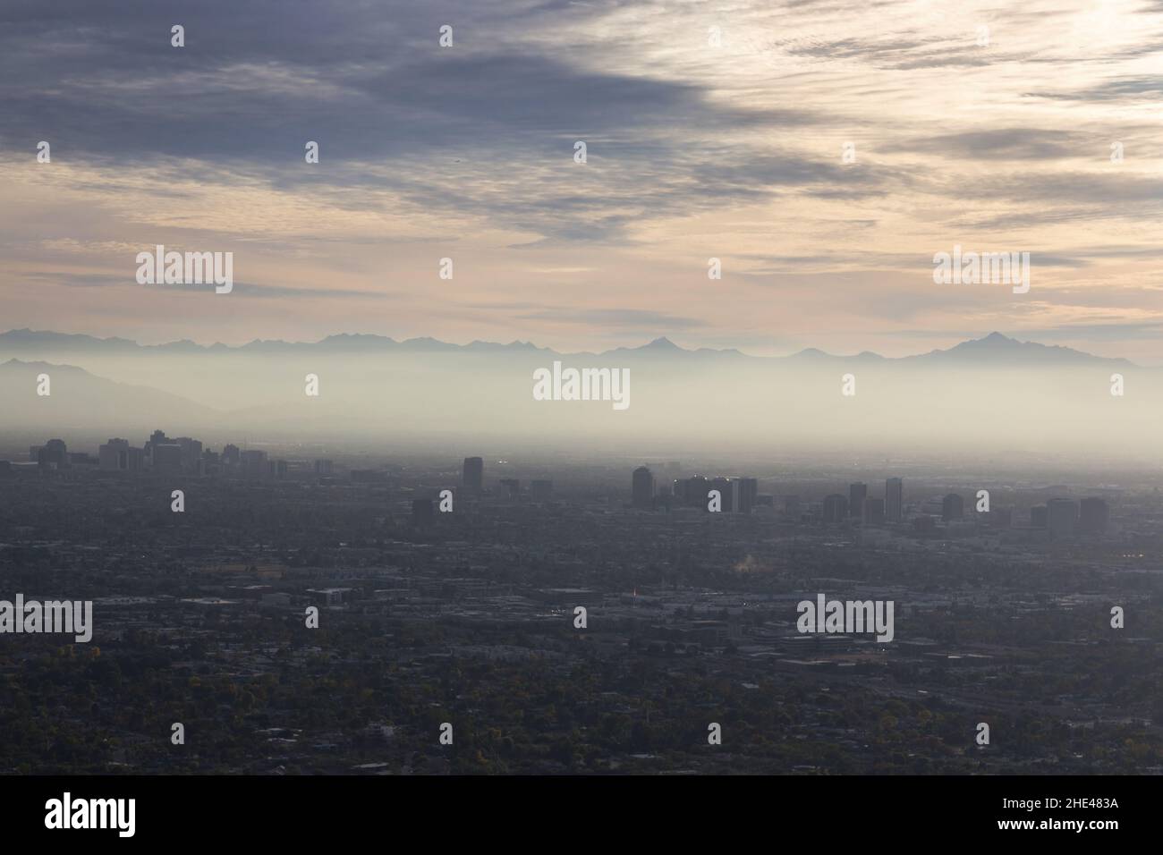 Aerial Landscape View Smog Pollution Layer Skyline Over Metropolitan Sun City Valley. Piestewa Peak Summit Phoenix Arizona Mountain Preserve Stock Photo