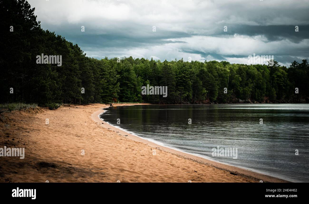 Beautiful view of the lake and sandy beach under the blue sky Stock ...