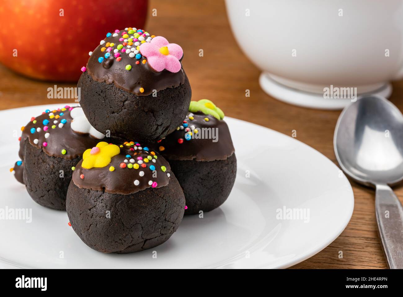 Pile of delicious homemade Choc Balls or Chocolate Balls in white