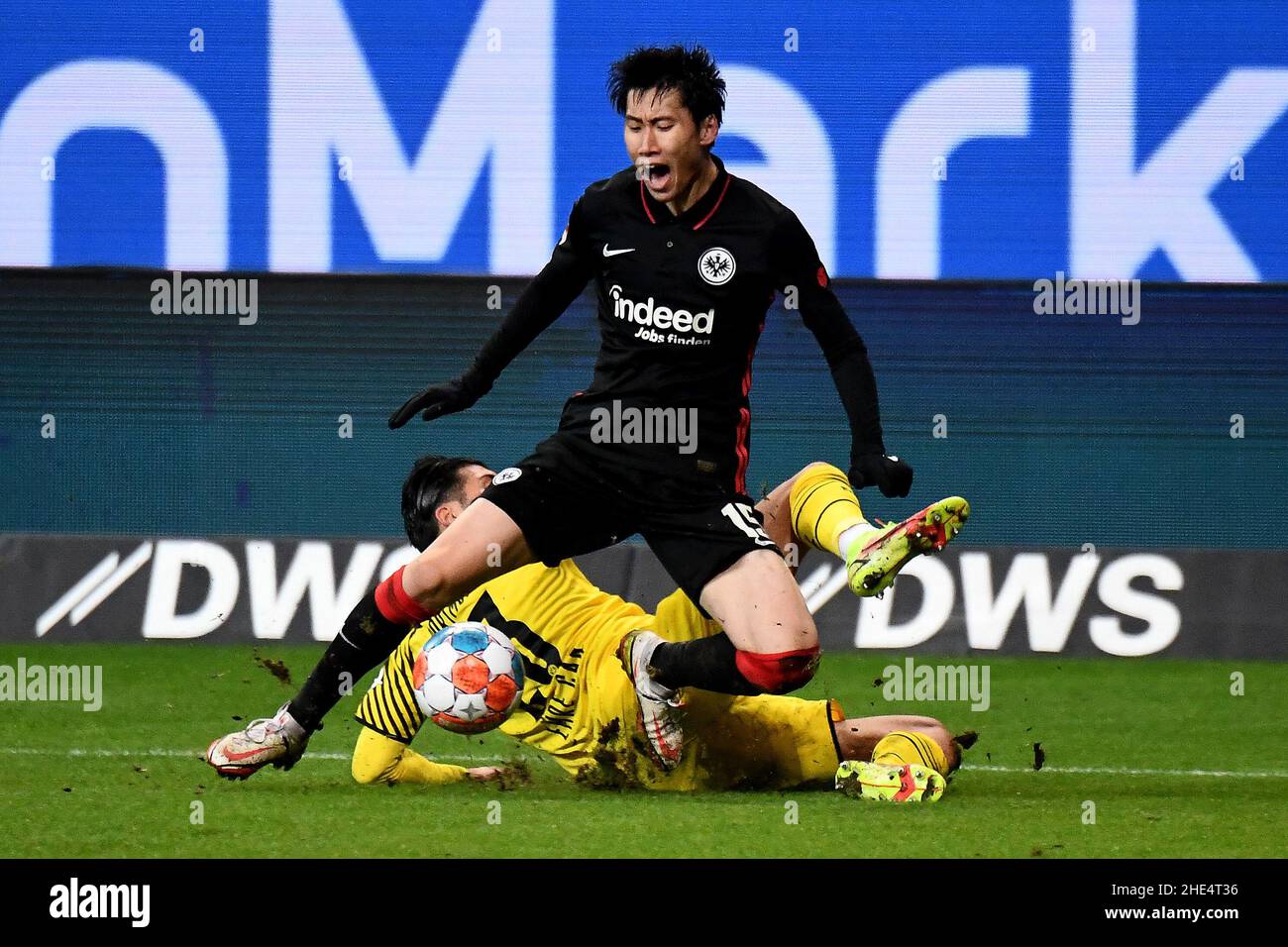 Frankfurt, Germany. 8th Jan, 2022. Kamada Daichi (top) of Frankfurt competes during the German first division Bundesliga football match between Eintracht Frankfurt and Borussia Dortmund in Frankfurt, Germany, Jan. 8, 2022. Credit: Xinhua/Alamy Live News Stock Photo