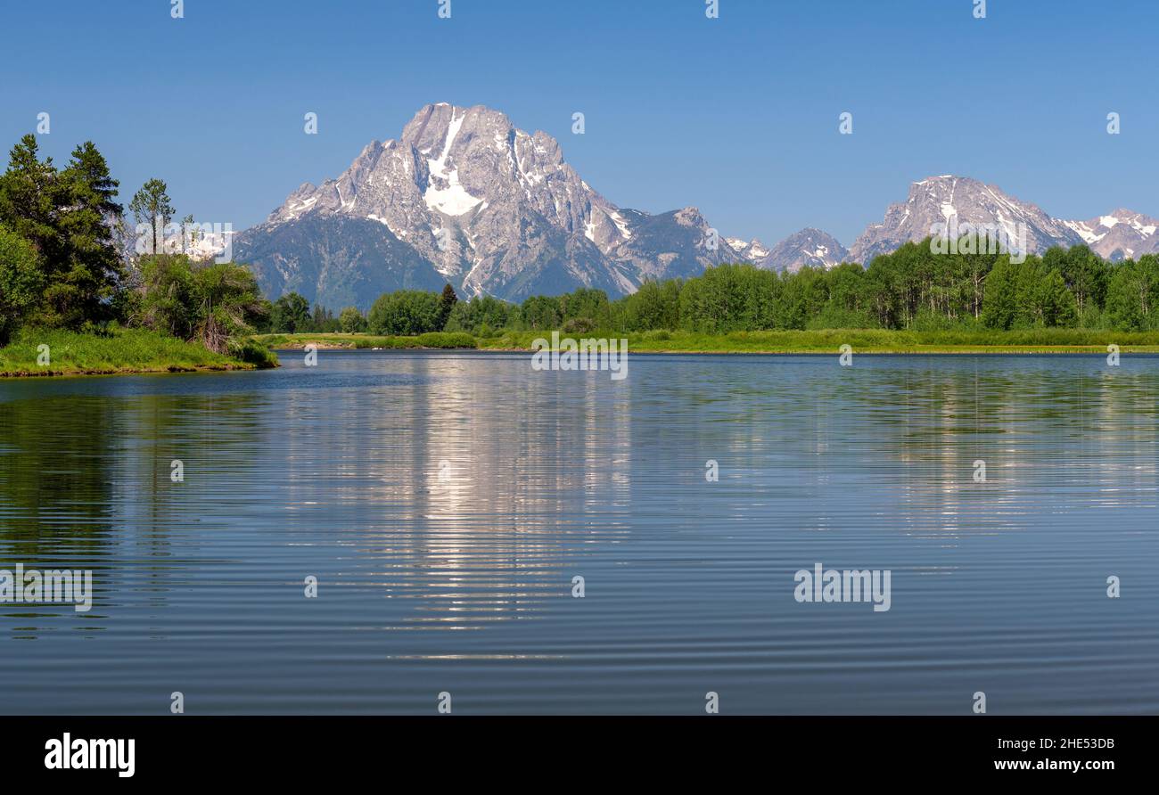 Grand Tetons mountain range summer reflection in the Snake River by Oxbow Bend, Grand Tetons national park, Wyoming, USA. Stock Photo