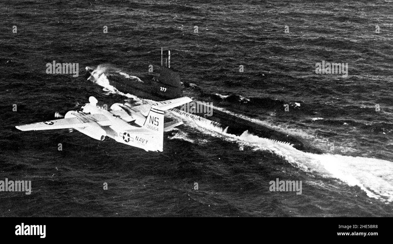 S-2F Tracker of VS-29 flying over USS Menhaden (SS-377) 1964. Stock Photo