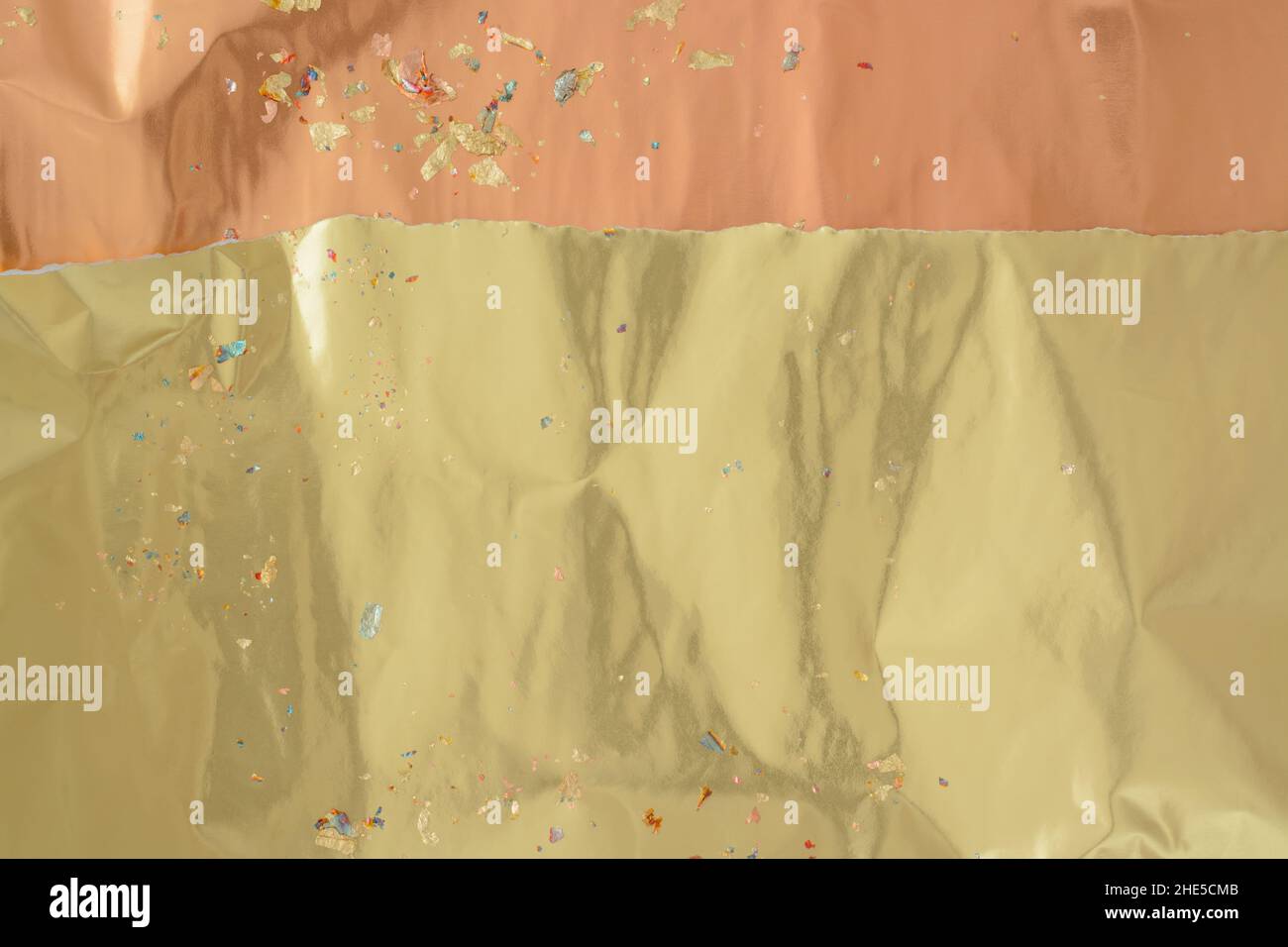 Background with gold and copper sheets, copy space, horizontal format Stock Photo