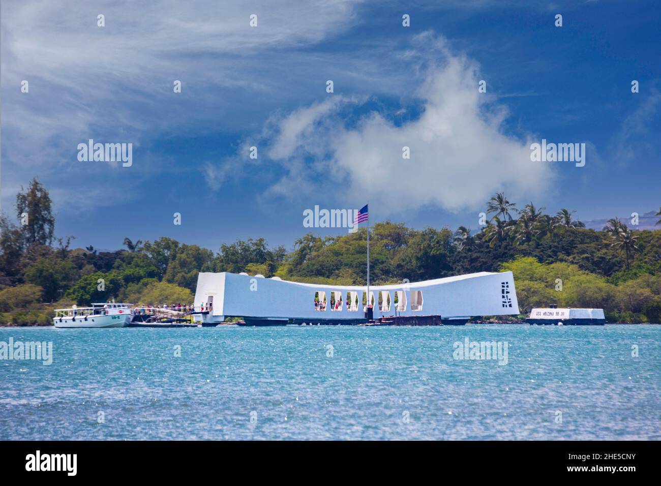 USS Arizona memorial at Pearl Harbor on Oahu in Hawaii, a graveyard for the men lost aboard the ship when it sank during the Pearl Harbor attack and a Stock Photo