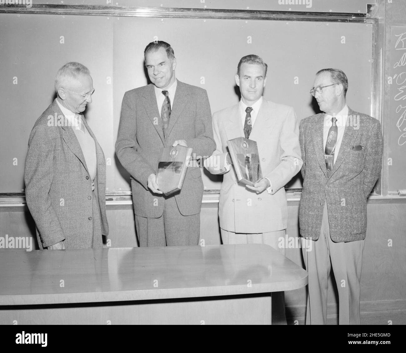 Safety awards. Left to right- Donald Cooksey, Glenn Seaborg, M. Leavitt, and Carroll Winterstein. Photograph taken September 22, 1955 Stock Photo