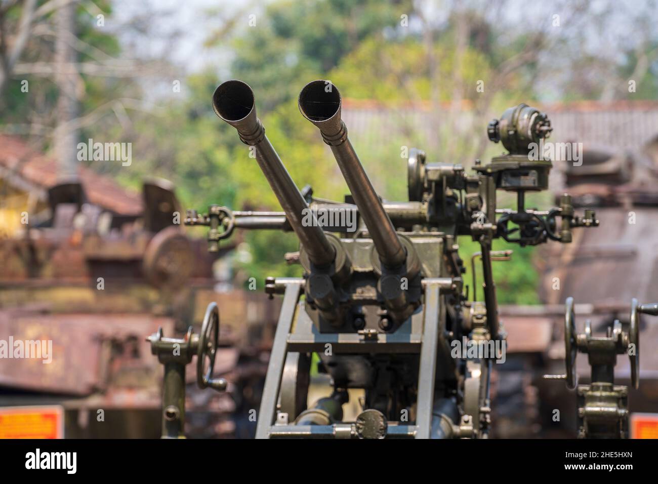 37mm anti aircraft artillery in the outdoors museum in Ho chi Minh city, Vietnam, close up double barrelled gun Stock Photo