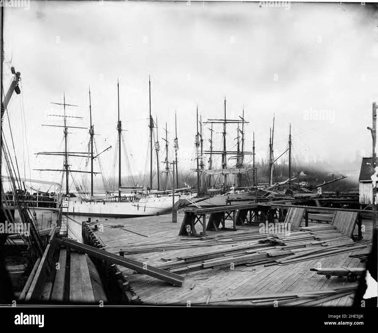 Sailing vessels ALTA, AMARANTH, and unknown ship at dock, Washington ...