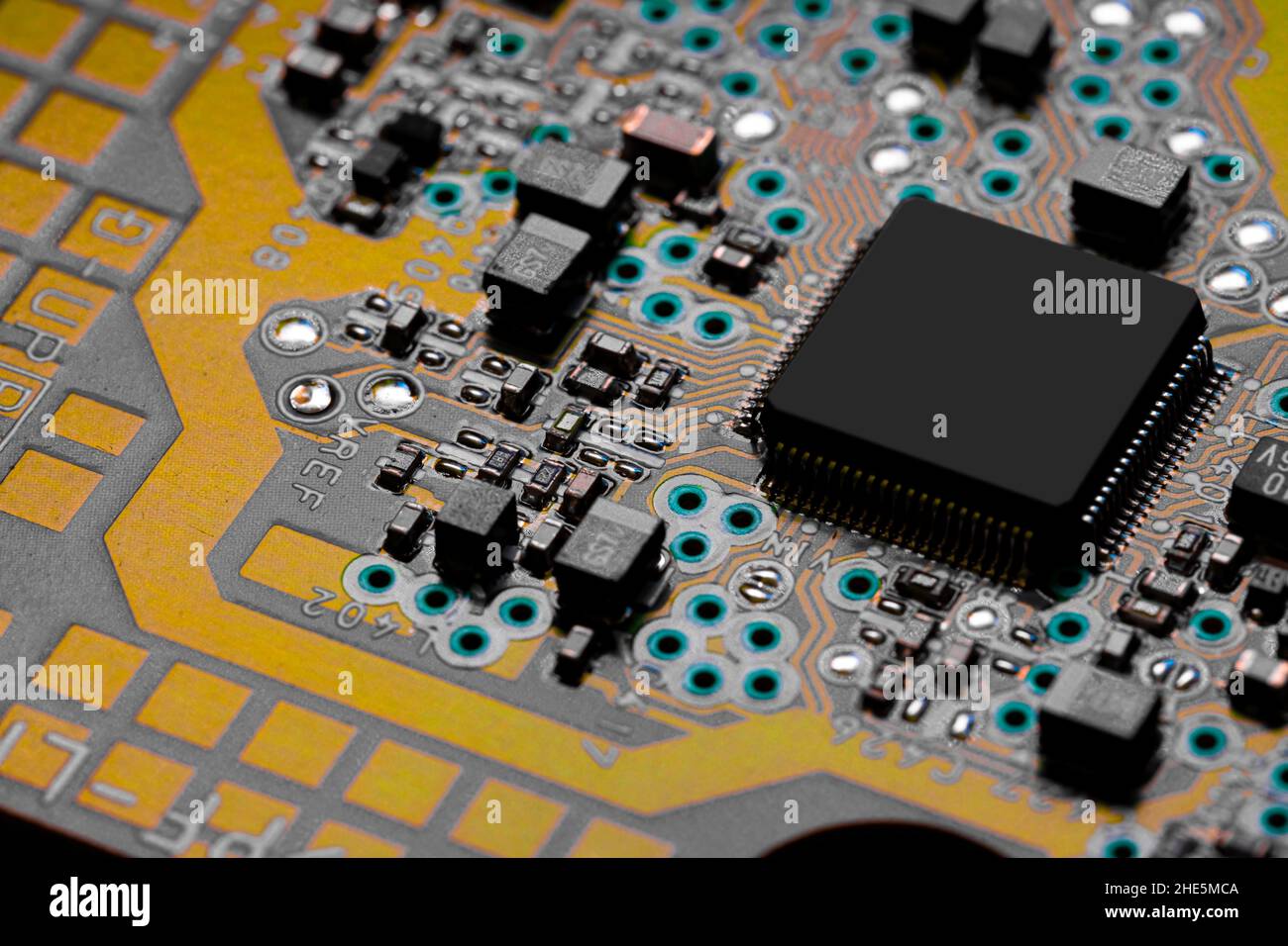 Macro Close up of printed wiring and components on PC circuit board ...