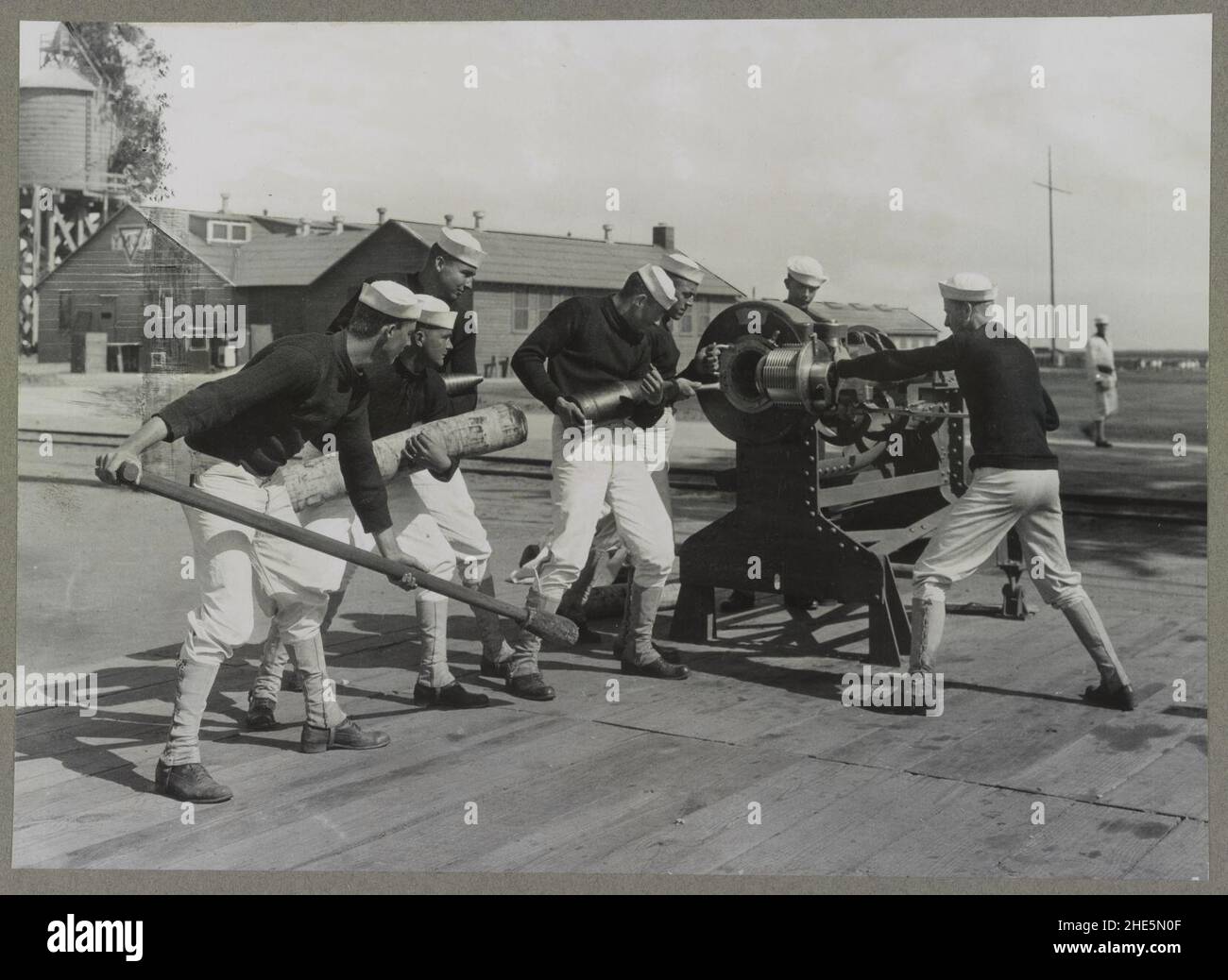Sailors firing big stationary guns, U.S. Naval Training Station, Camp ...