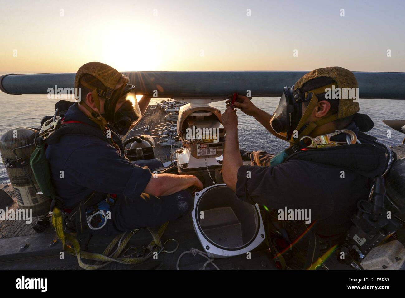 Sailors repair a radar. (13405513064). Stock Photo