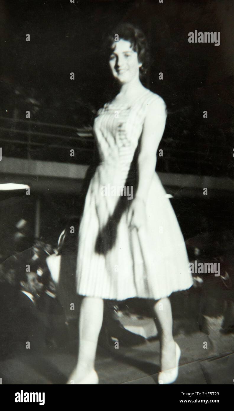 Young woman catwalking demonstrating clothing at an indoor fashion show in the 1960s, Bulgaria, Eastern Europe Stock Photo