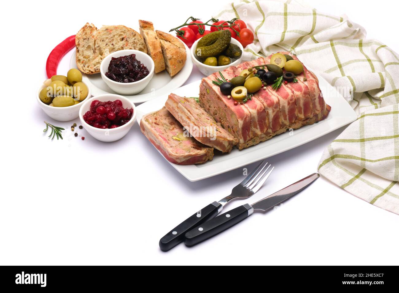 Traditional French terrine covered with bacon isolated on white