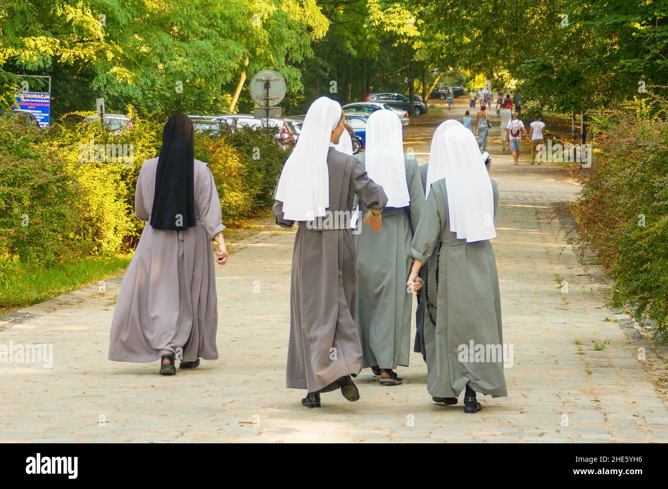 Group of nuns walking on a footpath at a park Stock Photo Alamy