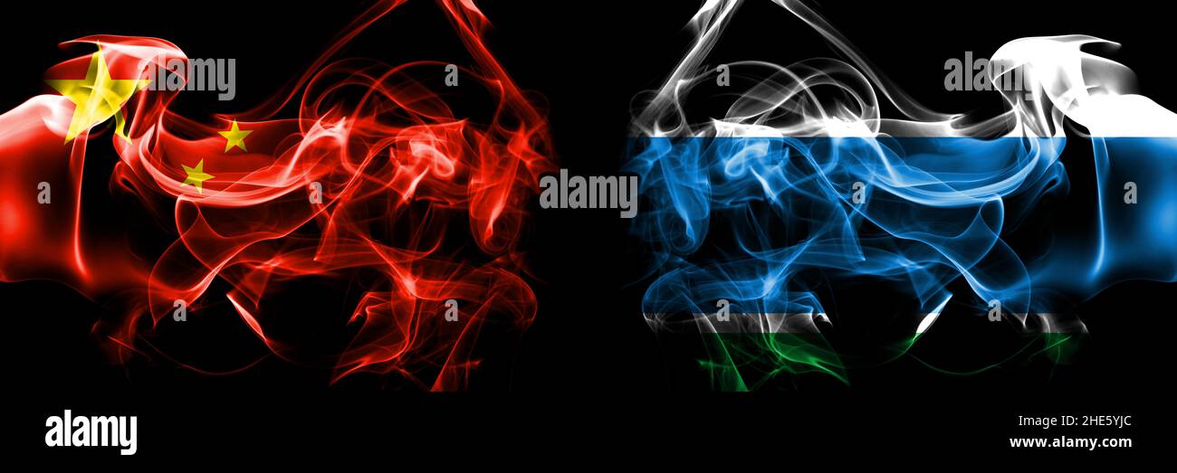 Flags of China, Chinese vs Russia, Russian, Sverdlovsk Oblast. Smoke flag placed side by side on black background. Stock Photo