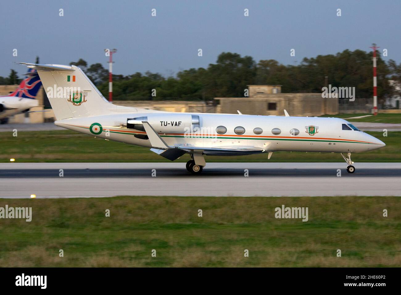 Ivory Coast Air Force Gulfstream Aerospace G-1159A Gulfstream III (REG: TU-VAF) landing runway 13 after sunset. Stock Photo