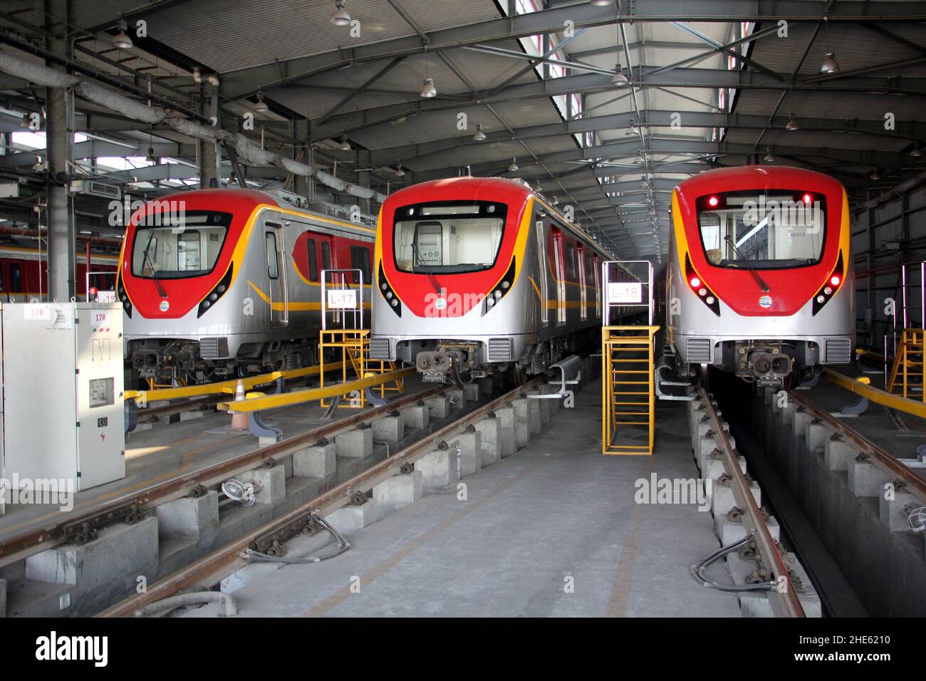 Lahore, Pakistan. 29th Dec, 2021. The Orange Line metro trains are seen at the terminal station in Lahore, Pakistan, Dec. 29, 2021. Officially open to traffic on Oct. 25, 2020, the eco-friendly Orange Line metro train is an early project under the China-Pakistan Economic Corridor (CPEC), a flagship project of the China-proposed Belt and Road Initiative. TO GO WITH 'Feature: Lahore Orange Line, epitome of China-Pakistan friendship' Credit: Jamil Ahmed/Xinhua/Alamy Live News Stock Photo
