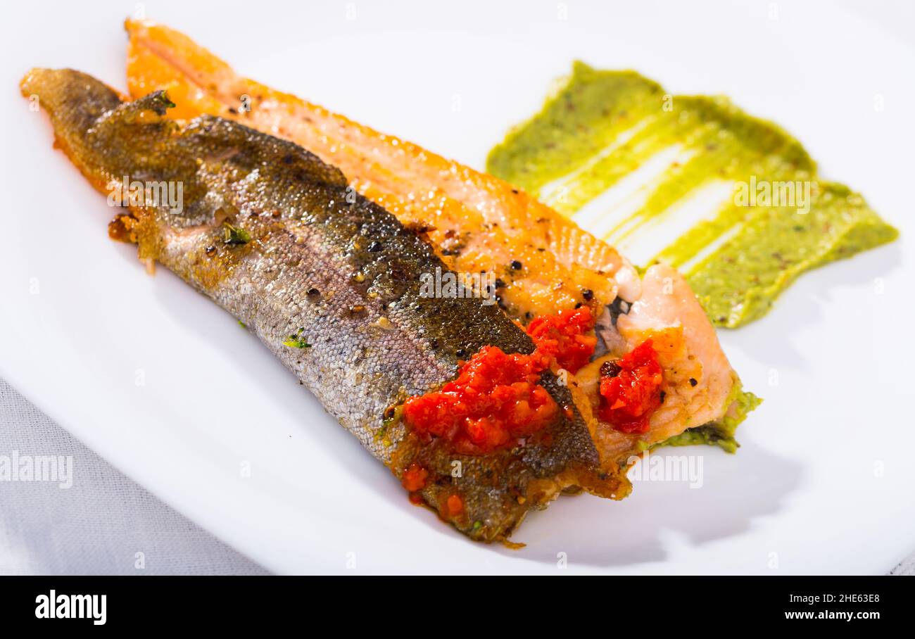 Fried trout fillets with sauces Stock Photo Alamy