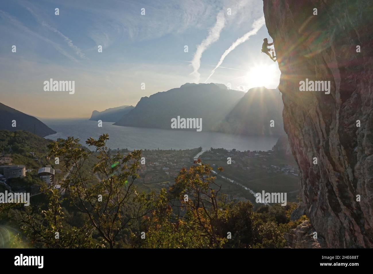 Climbing at sunset above lago di Garda Stock Photo
