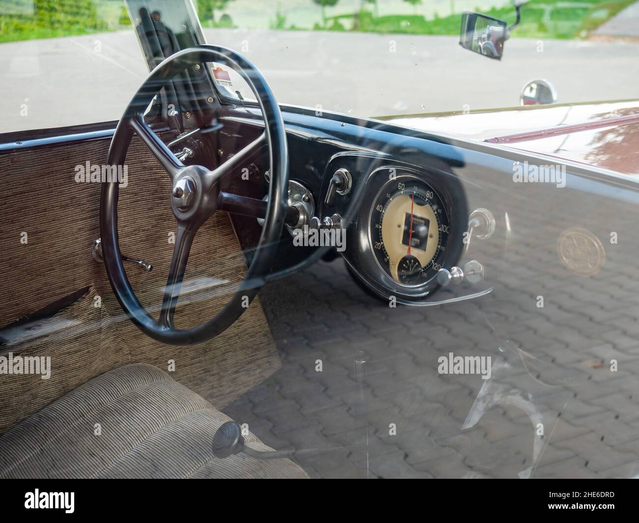 Palavsky Oldtimer, the vintage rally show at Winery Zajeci, Czechia. 27th of August, 2021. Steering wheel of Peugeot 201 vintage car.  Historical cars Stock Photo
