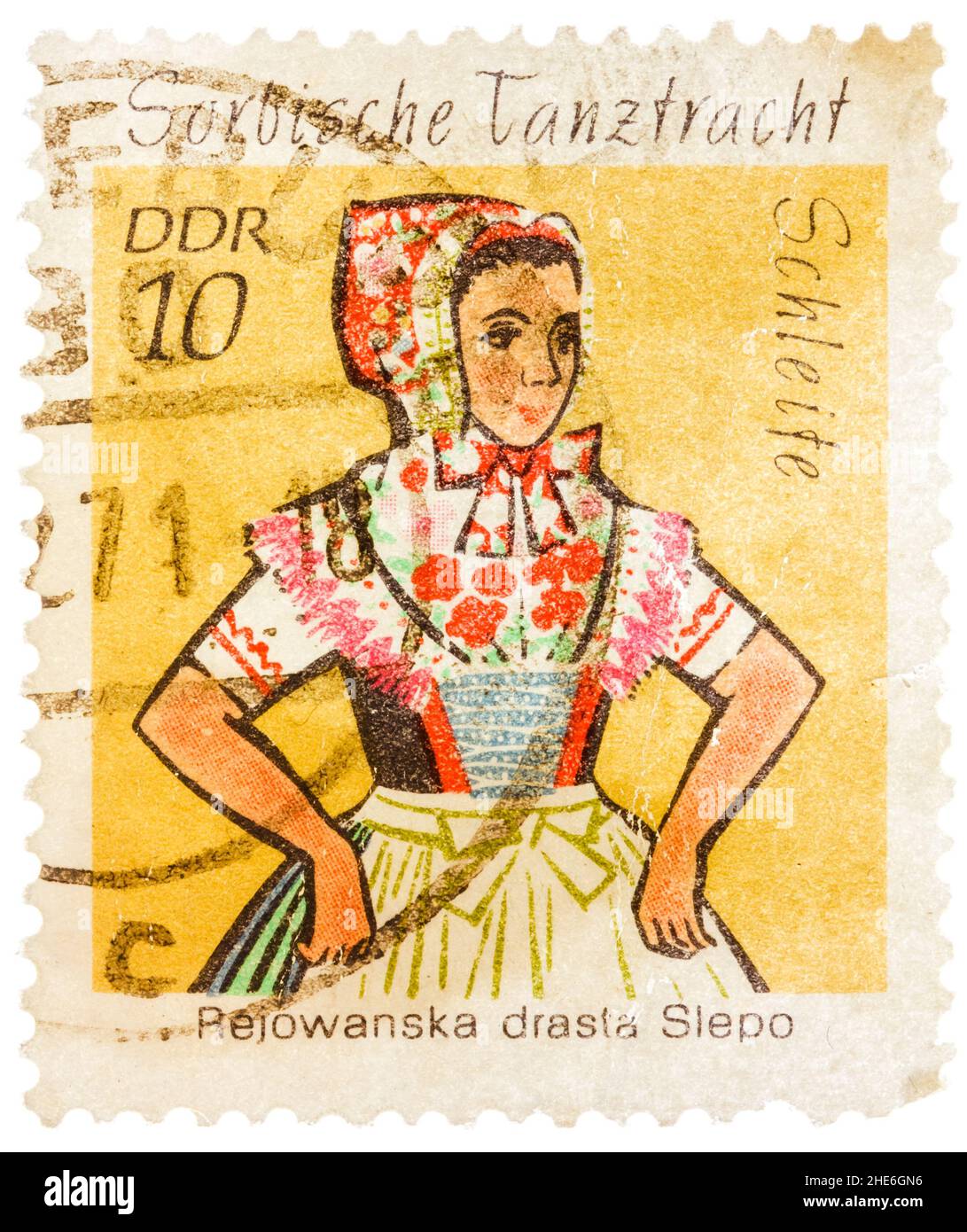 Stamp printed in German Democratic Republic (East Germany) shows Sorbische Tanztracht Rejowanska drasta Schleite Stock Photo