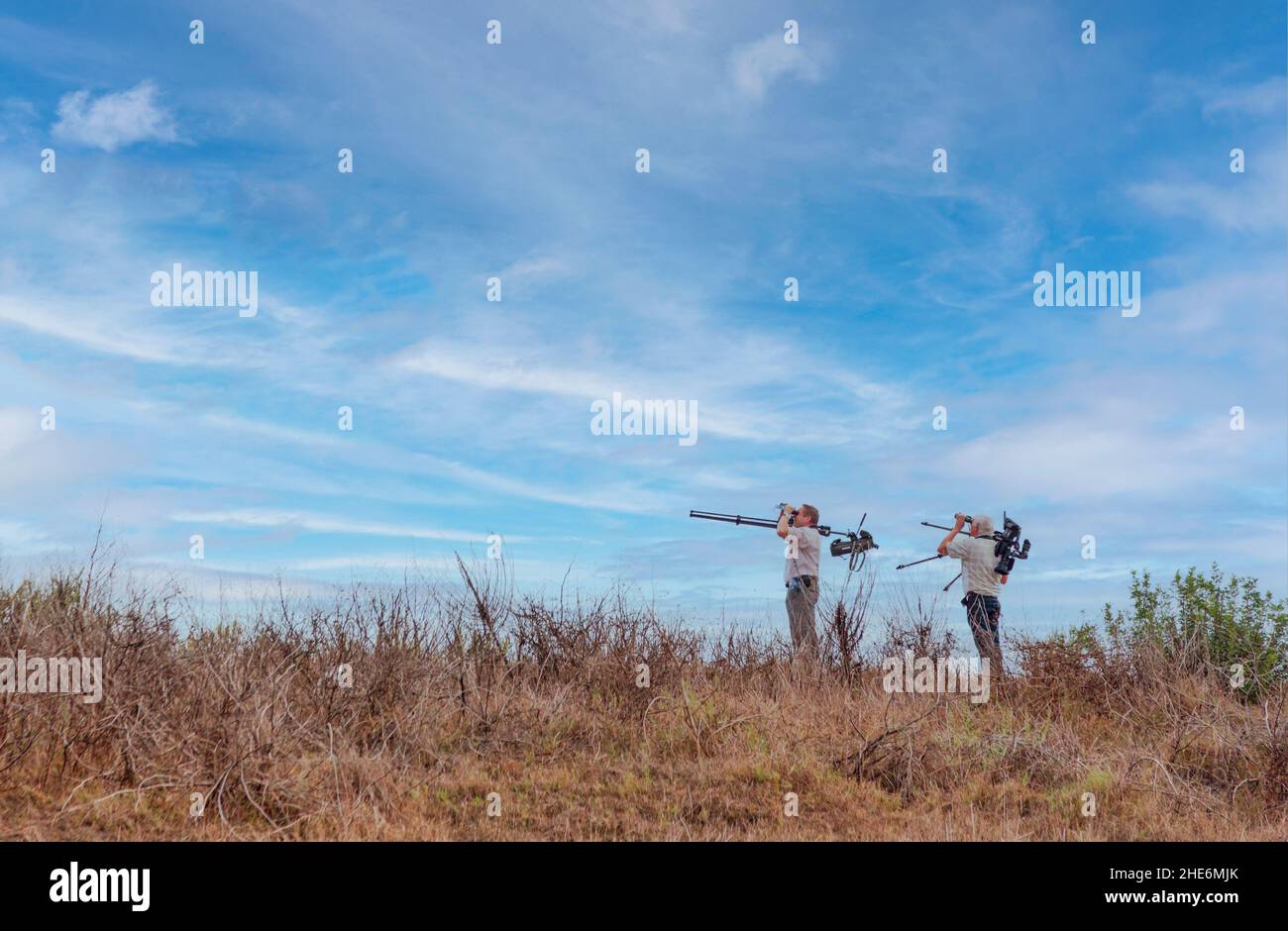 Birdwatchers with their equipment at the mouth of the Rio Guadalhorce, Malaga, Malaga Province, Andalusia, southern Spain. Stock Photo